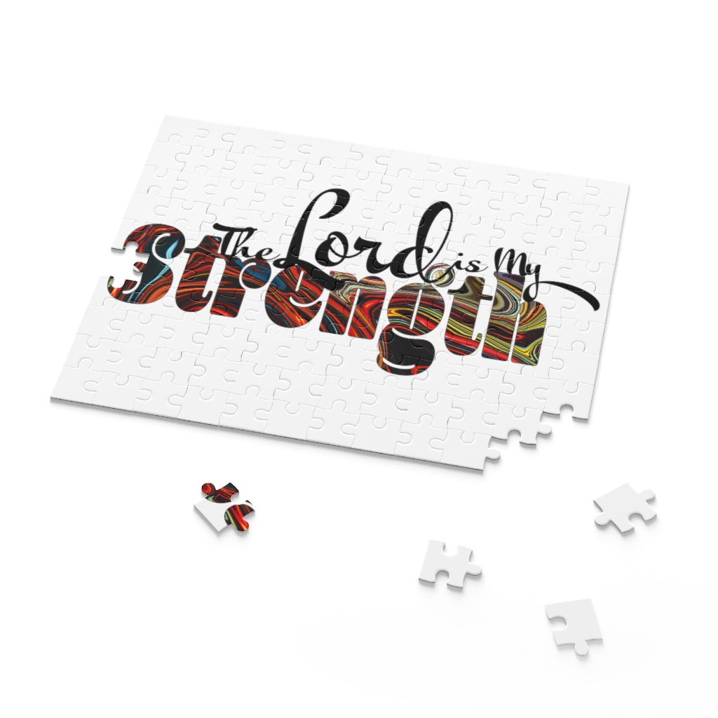 Christian Word Art jigsaw puzzle featuring 'The Lord is My Strength' in vibrant colors, made of high-quality chipboard.